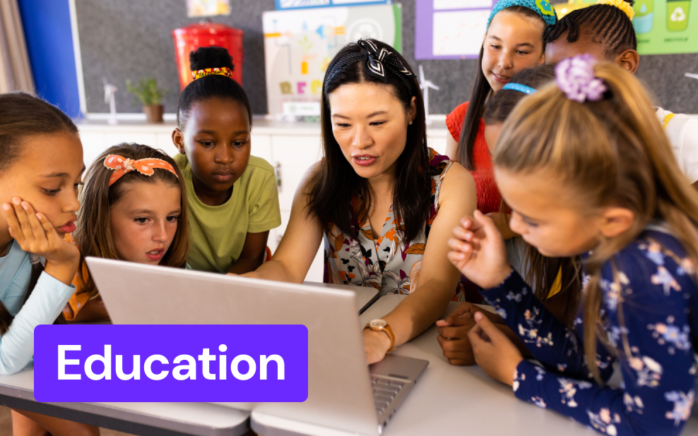 interactive video presentation tools a teacher showing a laptop screen to her students